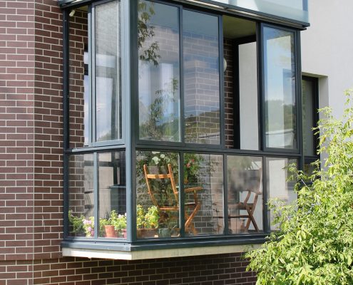 Fully glazed apartment balcony